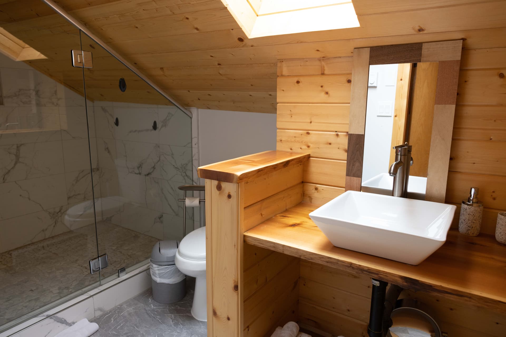 Bathroom with natural wood finishes