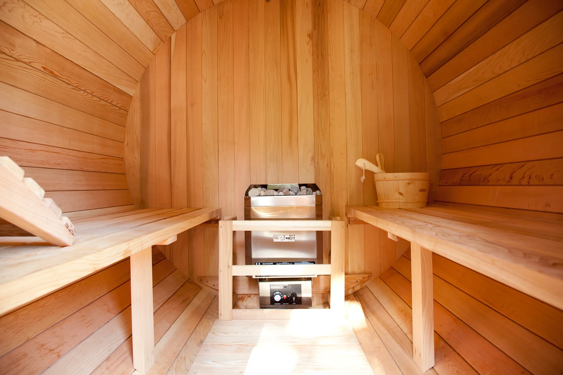 Barrel sauna exterior view in the rain